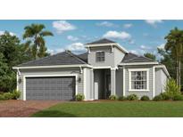 Charming single-Gathering home featuring a two-car garage, neutral paint, landscaped lawn, and well-maintained exterior at 12902 Tulum Loop, Venice, FL 34293