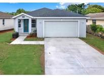 Charming single-story home with a well-maintained front yard and a two car attached garage at 4071 45Th N Ave, St Petersburg, FL 33714