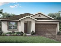 Charming single-story home featuring a neutral color scheme, attached two-car garage, and well-maintained landscaping at 12313 49Th E St, Parrish, FL 34219