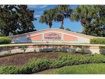 Waterside at Coquina Key South community sign featuring tropical landscaping and a welcoming entrance at 5012 Starfish Se Dr # B, St Petersburg, FL 33705