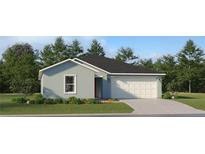 Charming one-story home with a two-car garage, manicured lawn and beautiful shrubbery at 15091 Zircon Red Dr, Wimauma, FL 33598