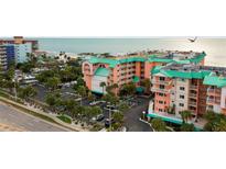 Beautiful condo community with beach views, palm trees and ample parking at 18400 Gulf Blvd # 1105, Indian Shores, FL 33785