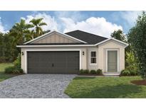 Charming single-Gathering home with a well-manicured lawn and a two-car garage at 37155 Sagemoor Dr, Zephyrhills, FL 33541
