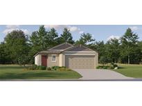 Charming single-story home with a neutral color palette, well-manicured lawn, and an attached two-car garage at 17581 Happytrails St, Land O Lakes, FL 34638