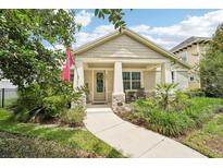Charming one-story home boasts a cozy front porch, well-maintained landscaping, and a welcoming entrance at 6005 Shell Ridge Dr, Lithia, FL 33547