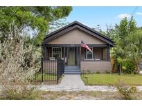 Charming single-story home with inviting front porch and well-maintained landscaping at 931 28Th N Ave, St Petersburg, FL 33704