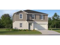Charming two-story home featuring a two-car garage and lush green lawn at 11926 Brae Way, Dade City, FL 33525