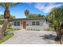 Charming one-story home featuring a newly painted exterior, a minimalist landscape design, and a concrete driveway at 3151 6Th S Ave, St Petersburg, FL 33712