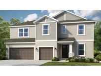 Two-story home boasts attached two car garage, neutral siding, and manicured front lawn at 1645 Longliner Loop, Wesley Chapel, FL 33543