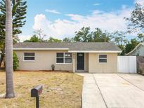 Charming single-story home with a well-maintained front yard and neutral paint at 6269 50Th N Ave, St Petersburg, FL 33709