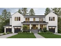Stunning two-story home features a modern design, a lush green lawn, and a welcoming front porch at 146 Bosphorous Ave, Tampa, FL 33606