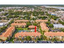 Aerial view of the Beachway Condominiums community with lush landscaping and beautiful buildings at 10764 70Th Ave # 6210, Seminole, FL 33772