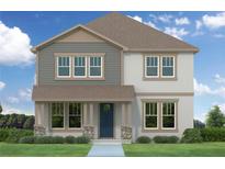 Charming two-story home featuring a welcoming front porch, neutral siding, and multiple windows offering ample natural light at 750 50Th N Ave, St Petersburg, FL 33703