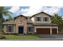 Two-story home featuring a stone facade, blue shutters, and a two-car garage, set on a well-maintained lawn at 174 Hidden Estates Ct, Brandon, FL 33511