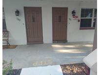 Inviting condo entrances featuring private door with a step; each unit is well-lit with exterior lighting at 650 Pinellas Point S Dr # 101, St Petersburg, FL 33705