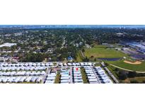 This aerial view showcases the community, proximity to recreation, and neighborhood at 663 54Th S Way # 146, Gulfport, FL 33707