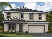 Charming two-story home with a two car garage, manicured lawn and beautifully landscaped front yard at 3927 Farm Garden Ct, Lakewood Ranch, FL 34211