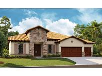 Charming single-story home featuring a stone facade, warm-toned tile roof, and a three-car garage at 14507 Swiss Bridge Dr, Lithia, FL 33547