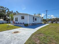Charming single-story home featuring a well-maintained lawn and inviting curb appeal at 4609 10Th Street E Ct, Ellenton, FL 34222