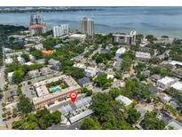 Aerial view of neighborhood and townhouse location in beautiful beachside community with skyline and ocean view at 2011 S Carolina Ave, Tampa, FL 33629