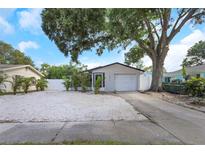 Charming single-story home with a well-maintained front yard and a one-car garage at 5413 15Th Ave S, Gulfport, FL 33707