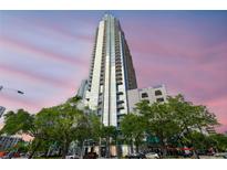 Modern high-rise building with floor-to-ceiling windows and balconies at 777 N Ashley Dr # 3009, Tampa, FL 33602