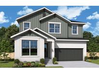 Charming two-story home featuring a clean white stucco first floor and board and batten siding on the second floor at 3108 W Varn Ave, Tampa, FL 33611