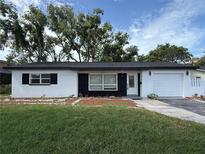 Charming single-story home with a well-maintained lawn and a freshly painted exterior in a quiet neighborhood at 2254 66Th S Ave, St Petersburg, FL 33712