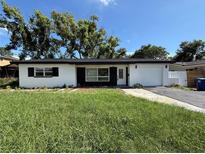 Charming single-story home with a manicured front yard and attached one car garage at 2254 66Th S Ave, St Petersburg, FL 33712