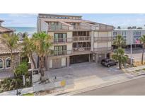 Beautiful multi-level beachfront condo featuring multiple balconies and covered parking at 19010 Gulf Blvd # 203, Indian Shores, FL 33785