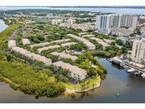 Beautiful waterfront condos with pool, surrounded by lush landscaping, near downtown at 716 Promenade Pl, Tampa, FL 33602