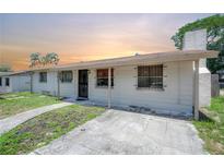 Modest home with a covered entrance and a simple, functional design at 2614 E Liberty St, Tampa, FL 33612