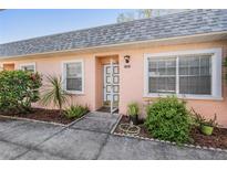 Charming home featuring well-kept landscaping, a tidy entry, and plenty of natural light, creating an inviting curb appeal at 3839 Trophy Blvd # 3839, New Port Richey, FL 34655
