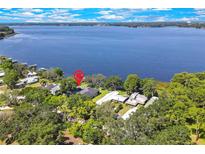 Stunning lakefront property with lush greenery and scenic water views at 550 George S St, Tarpon Springs, FL 34688