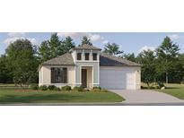 Charming single-story home featuring a two-car garage, neutral paint, and a well-manicured lawn at 9486 Gladsome Dr, Land O Lakes, FL 34637