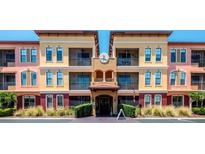 Beautiful condo building featuring balconies, attractive landscaping, and stucco in a desirable location at 13941 Clubhouse Dr # 308, Tampa, FL 33618