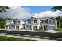 New townhomes feature attached garages, neutral color schemes, and professionally landscaped lawns in a desirable location at 14350 Lilac Sky Ter, Bradenton, FL 34211