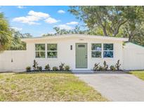 Charming single-story home featuring a well-maintained lawn and a freshly painted exterior with updated landscaping at 7991 54Th N St, Pinellas Park, FL 33781