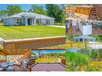 Beautiful single-story home with lush lawn, fenced backyard, deck, hot tub, grill, and pool table perfect for outdoor living at 15207 Taralane Ave, Brooksville, FL 34604