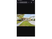 Charming single-story home with a well-maintained lawn and inviting front entrance at 4611 17Th N Ave, St Petersburg, FL 33713