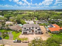 Stunning new two-story home with lush landscaping in a desirable neighborhood near a golf course and the ocean at 944 31St Ne Ter, St Petersburg, FL 33704