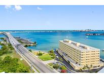 Stunning waterfront condo with panoramic views of the bay, bridge, and surrounding cityscape at 100 Bluff View Dr # 404C, Belleair Bluffs, FL 33770