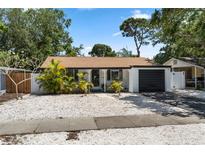 Charming single-story home with a well-manicured front yard and mature landscaping at 8020 24Th Ave N, St Petersburg, FL 33710