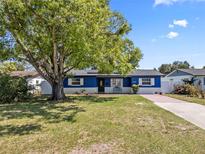Charming single-story home with landscaped front yard and mature shade tree at 2426 17Th N Ave, St Petersburg, FL 33713