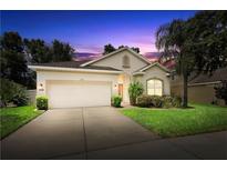 Charming single-Gathering home with a well-manicured lawn and attached two-car garage in a quiet neighborhood at 203 Montara Dr, Seffner, FL 33584