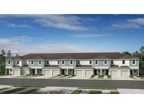 Modern townhome exterior showcases covered entries, garages, and neutral color palette at 13244 Stable Pl, Parrish, FL 34219