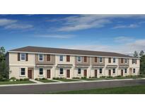 New townhouse complex with multiple units, offering modern living and community appeal at 14036 Textile Run, Parrish, FL 34219