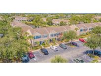 Inviting townhomes boast well-maintained landscaping and convenient parking at 6229 Bayside Key Dr, Tampa, FL 33615