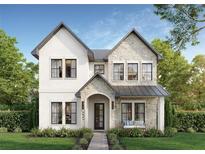 Charming two-story home featuring a stone and stucco facade, arched entryway, bench seating and beautifully landscaped front yard at 2534 2Nd S Ave, St Petersburg, FL 33712