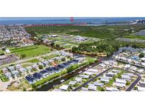 Waterfront homes with private pools and boat docks in a coastal community with easy access to the Gulf at 6534 Simone Shores Cir, Apollo Beach, FL 33572